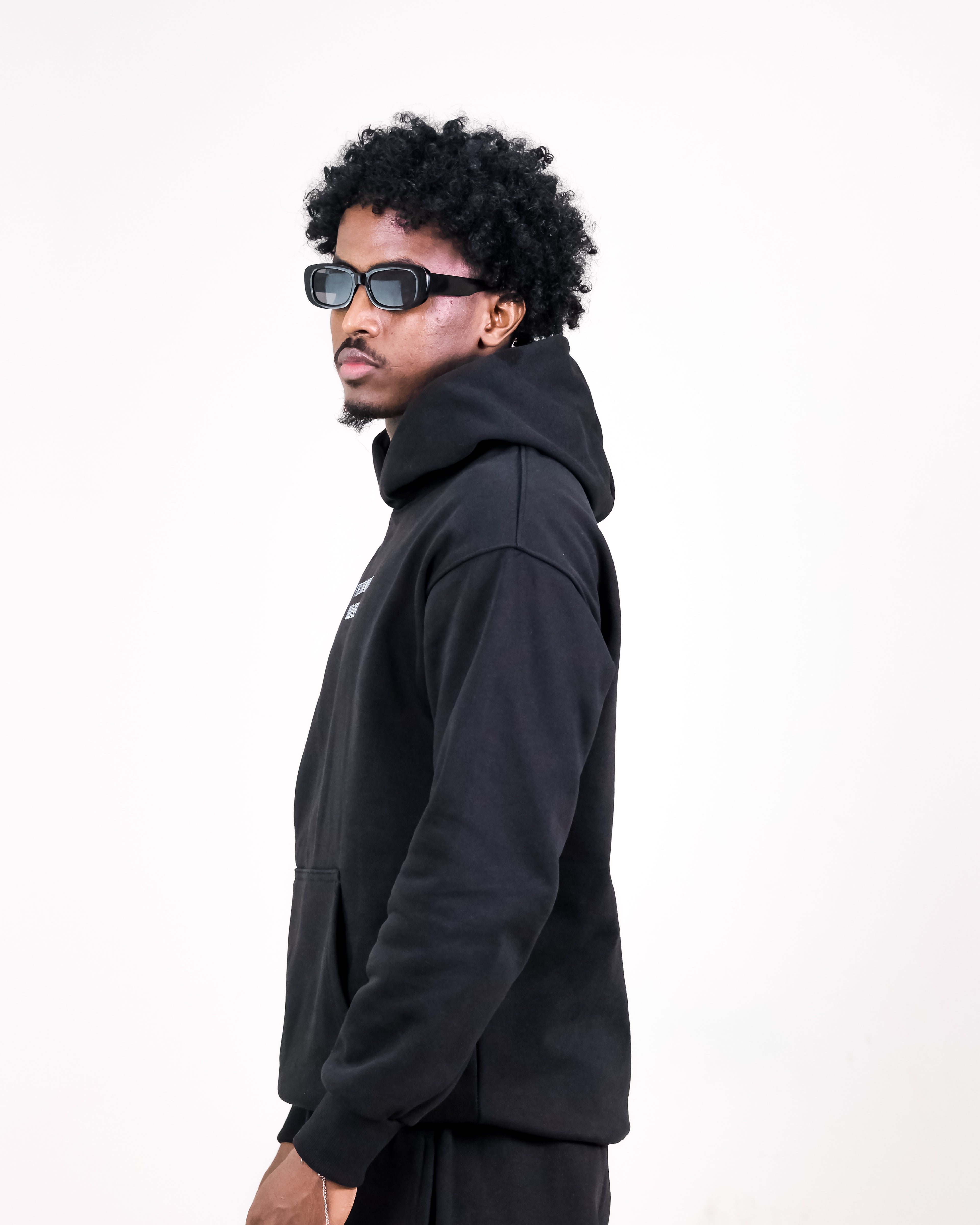 Oversized Black Hoodie - 'Be The Story' Inspirational Text Graphic