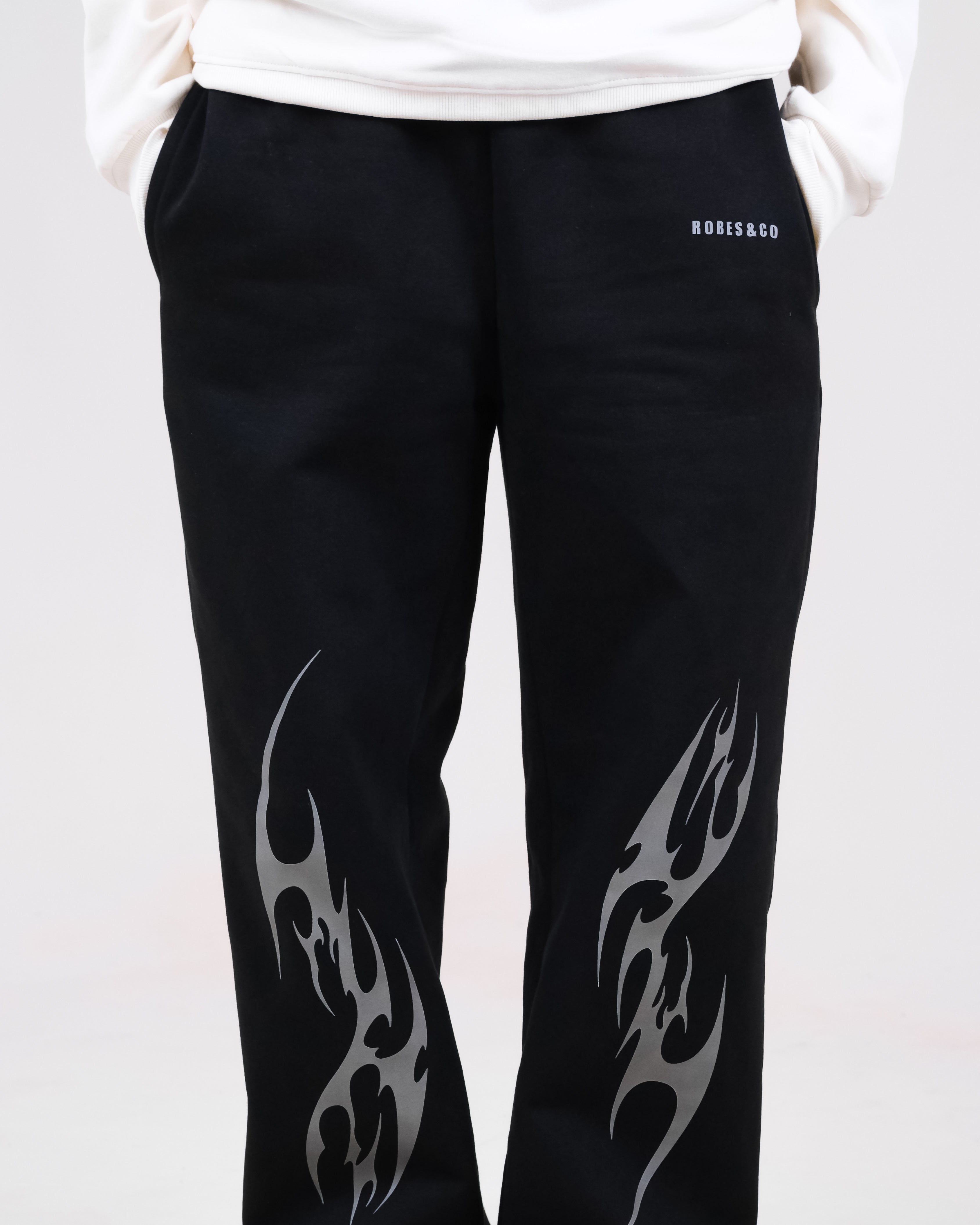 Black Streetwear Sweatpants with Reflective Tribal Flame Graphic Print