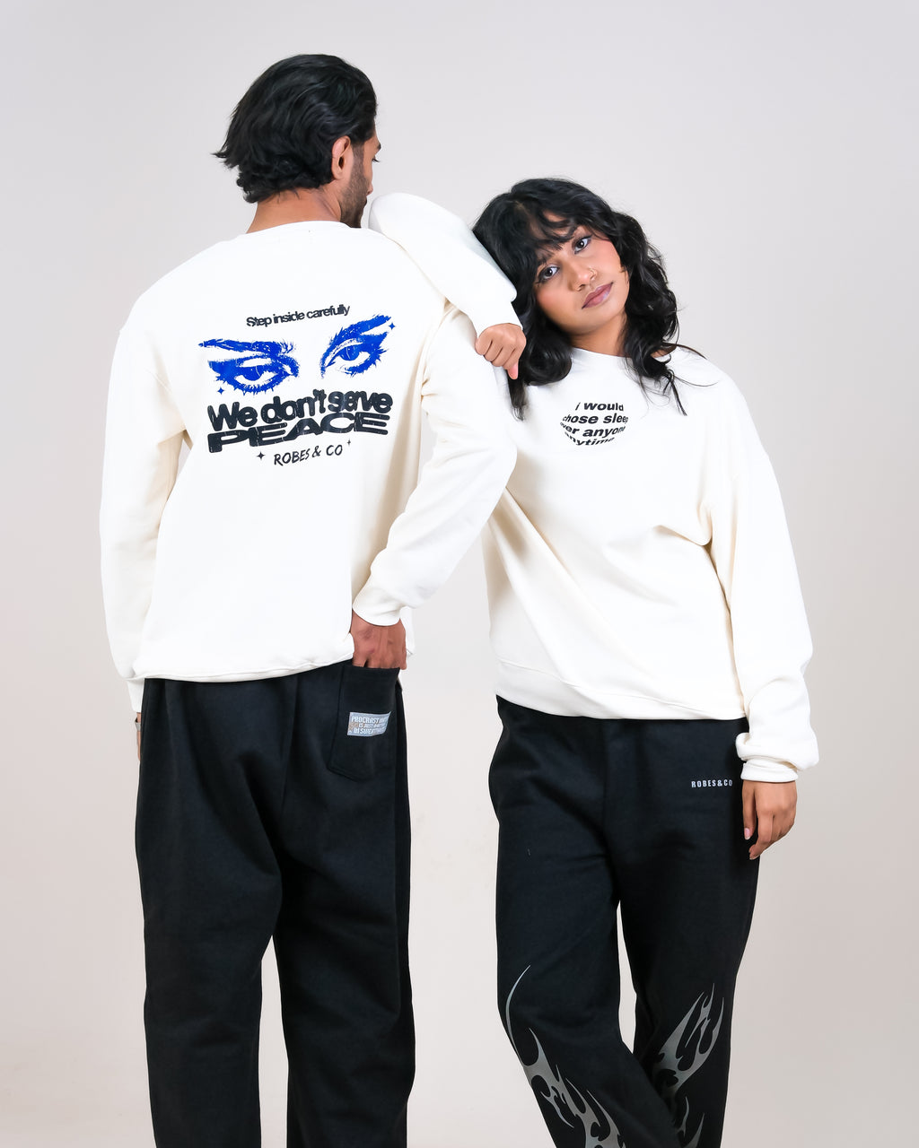 Ivory Oversized Sweatshirt - 'We Don't Serve' Siren Eye Graphic