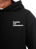 "PRIORITIES OVER CONVENIENCES" Minimalist Black Hoodie